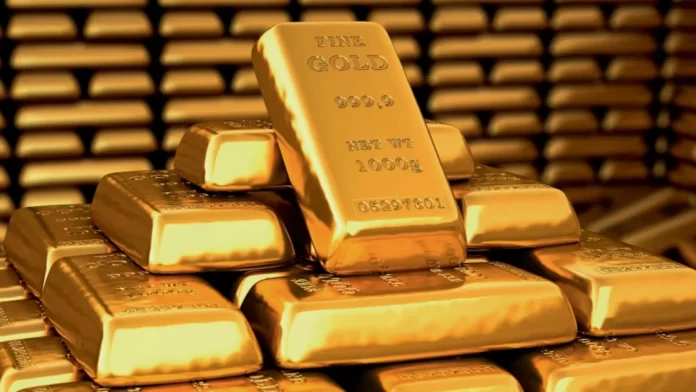 Giá vàng giảm 2% sau khi chạm mức đỉnh